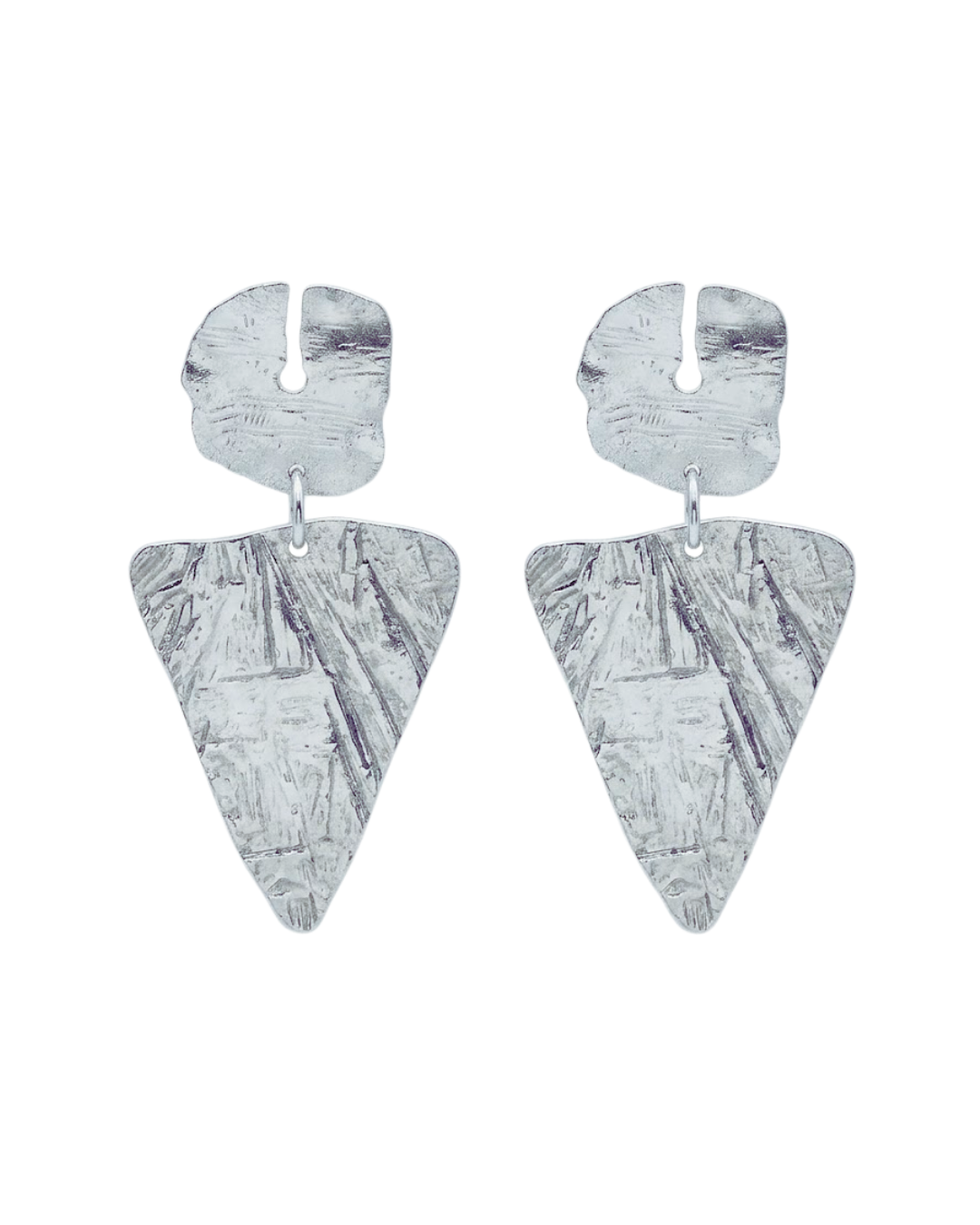 Cunty silver earrings inspired by doritos made by hand in NYC